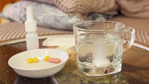 Soluble White Tablet Dissolves In Glass With Water