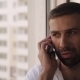 Man Talking On The Phone At The Window - VideoHive Item for Sale