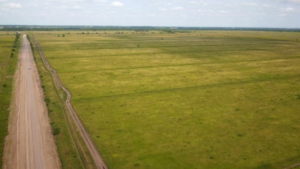 Aerial Shot Of Car On The Rural Road