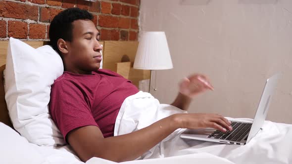 Tension and Headache Frustrated African Man Working on Laptop Stairs