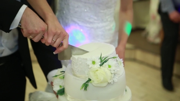 Hand Cut The Wedding Cake Brides