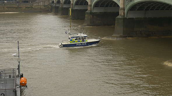 Police Speed Boat on River