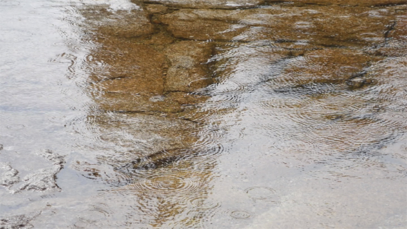 Rain Over Rocks