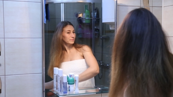 Woman Brushing Her Hair
