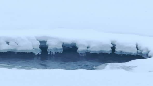 Icy Forest River in a Cold Day