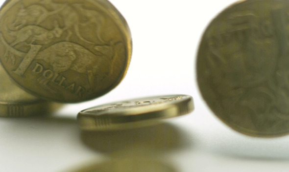 Australian Coins Bounce Very Slowly Through Frame