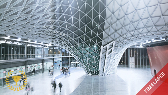 People Walking in a Futuristic Hall