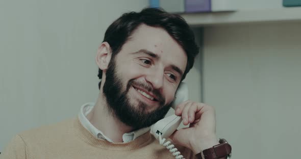 Call Center Worker Speaking with a Client
