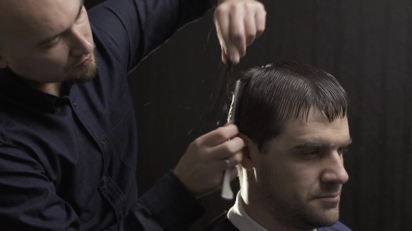 Hairdresser Making Razor Haircut At The Beauty