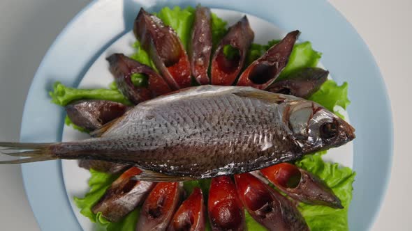 Fish Dish Healthy Tasty Salted Fish Sliced with Caviar on White Plate Spinning on Plate