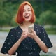 Happy Female Winner Redhaired Successful Woman Girl Young Model Wins Online Lottery Reads Positive - VideoHive Item for Sale