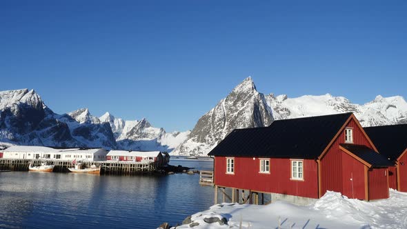 Famous Multicolored Wooden Fishing Houses Rorbu On A Sea Shore 22