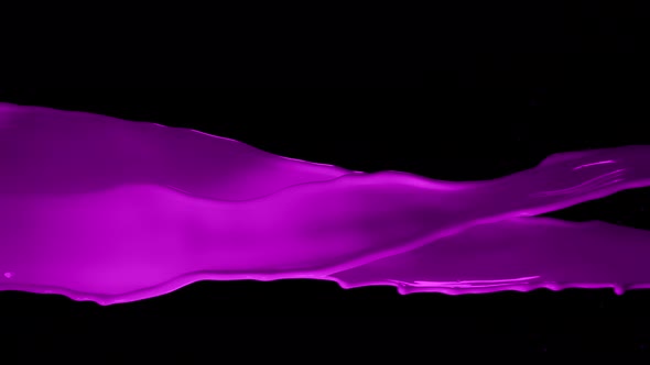 Super Slow Motion Shot of Twisting Pink Splash at 1000Fps Isolated on Black Background