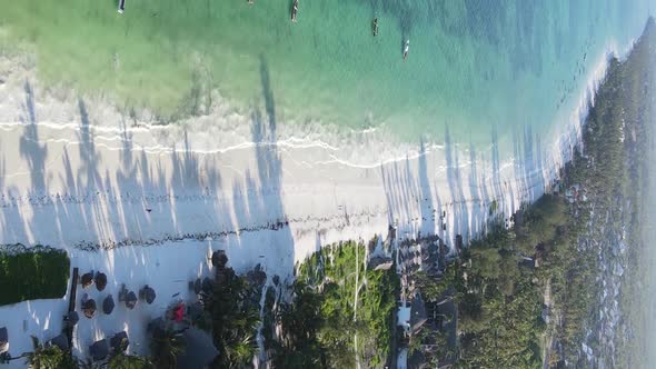 Vertical Video of the Ocean Near the Coast of Zanzibar Tanzania Aerial View