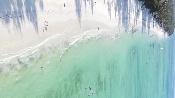 Vertical Video Boats in the Ocean Near the Coast of Zanzibar Tanzania Aerial View