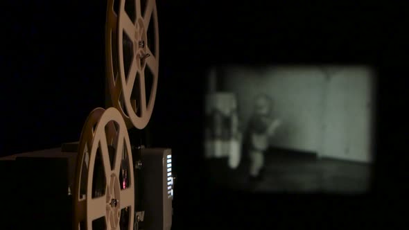 Vintage Projector Translates Old Film on the Screen. Close Up