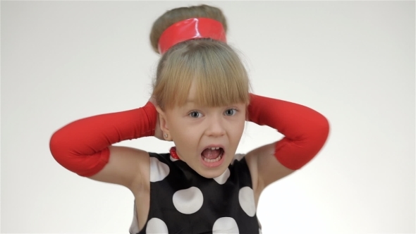 Kid Girl Covers His Ears With His Hands