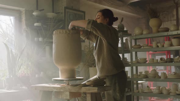 Woman Is Creating Vase In Art Studio