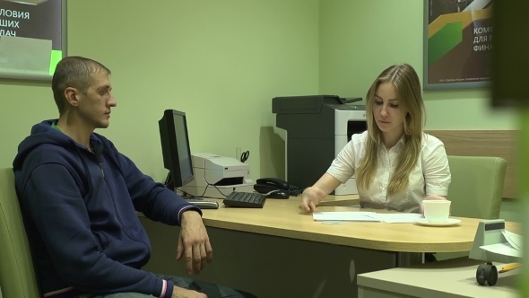 Businesswoman Signing Documents 