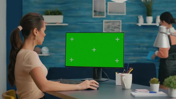 Caucasian Woman Working on Mock Up Computer Green Screen