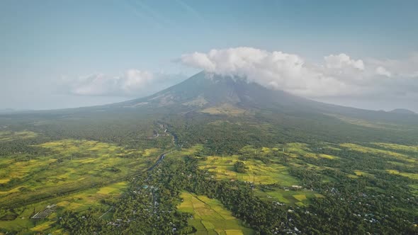 Green Tropic Farmlands at Volcano Hillside Valley Aerial