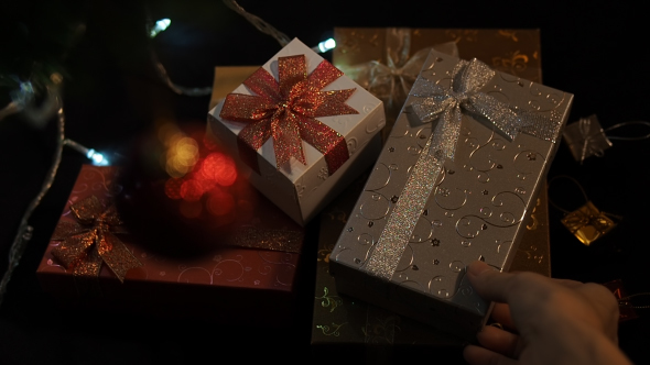 Placing Christmas Gift Box