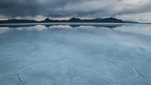 Time lapse over white salty landscape as clouds move by