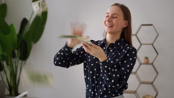 A Crazy Woman Screams Scattering Banknotes a Lot of Dollars