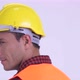 Rear View of Young Happy Hispanic Man Construction Worker Looking Back - VideoHive Item for Sale