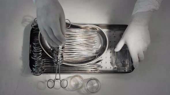 Nurse Preparing Sterile Surgical Instruments Healthcare Worker Prepares Tools