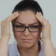 Woman with Glasses and Headache - VideoHive Item for Sale