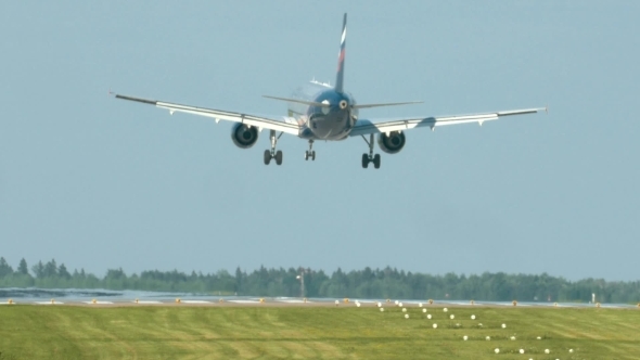 Airplane Landing On Take-off Runway