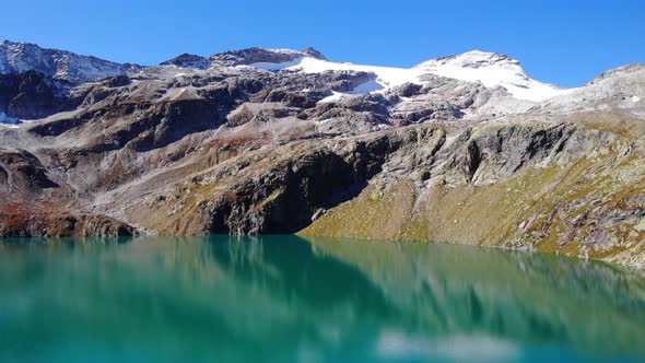 Rocky Mountain At Tauern National Park From Weisssee Lake At Daylight In Austria. - aerial