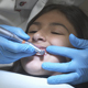 Dentist Polishes Young Girl Teeth - VideoHive Item for Sale