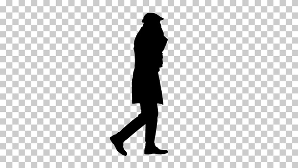 Silhouette man talking on the phone and walking, Alpha Channel