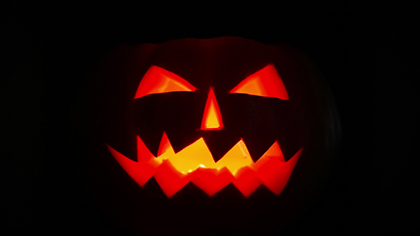Scary Halloween Pumpkin Jack-O-Lantern Candle Lit