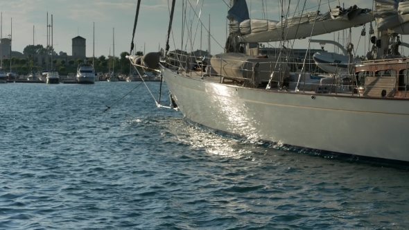 Large Sailing Yacht Moored In Marina At Sunset