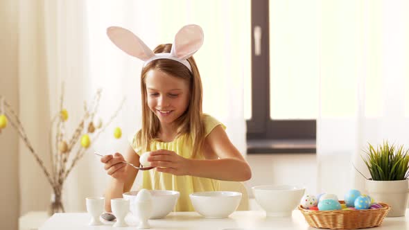 Girl Coloring Easter Eggs By Liquid Dye at Home