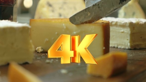 Cutting a Serving From The Cheese alt