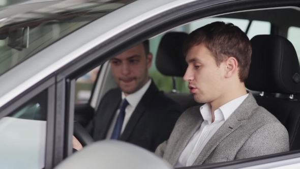 Buyer Inspects The Car That He Going To Buy alt