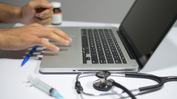 Doctor Working Online for Patient