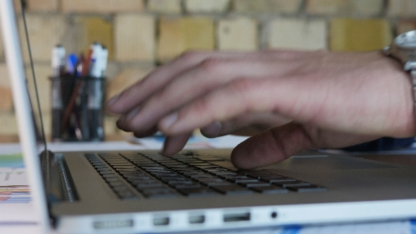 Businessman Keyboard Typing In Office