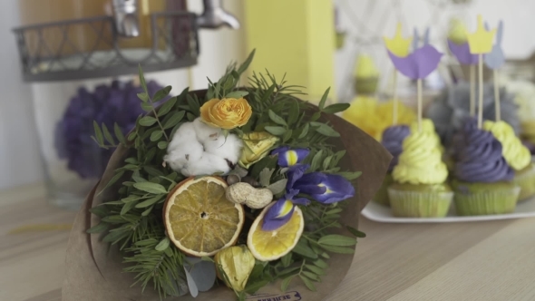 Holiday Table With Treats And Beautiful Bouquet