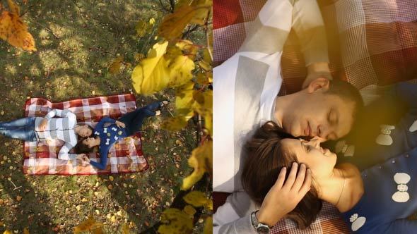 Couple Lying Under Autumn Tree