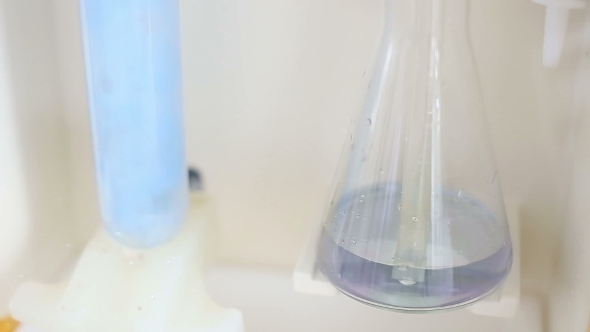 Glass In a Chemical Laboratory, Colored Liquid