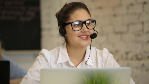Positive Girl Working In The Call Center 