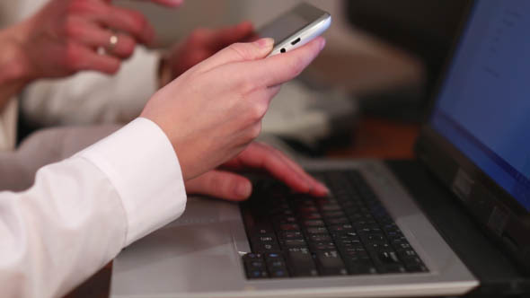 Partners Working at a Computer