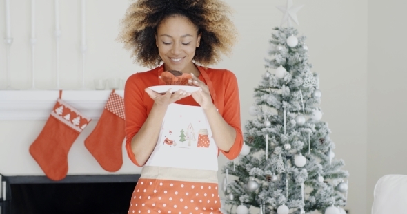 Young Cook With a Freshly Baked Xmas Cake