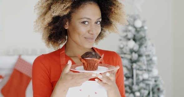 Young Cook With a Freshly Baked Xmas Cake