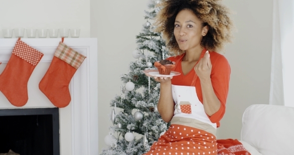 Happy Young African Woman Celebrating Christmas